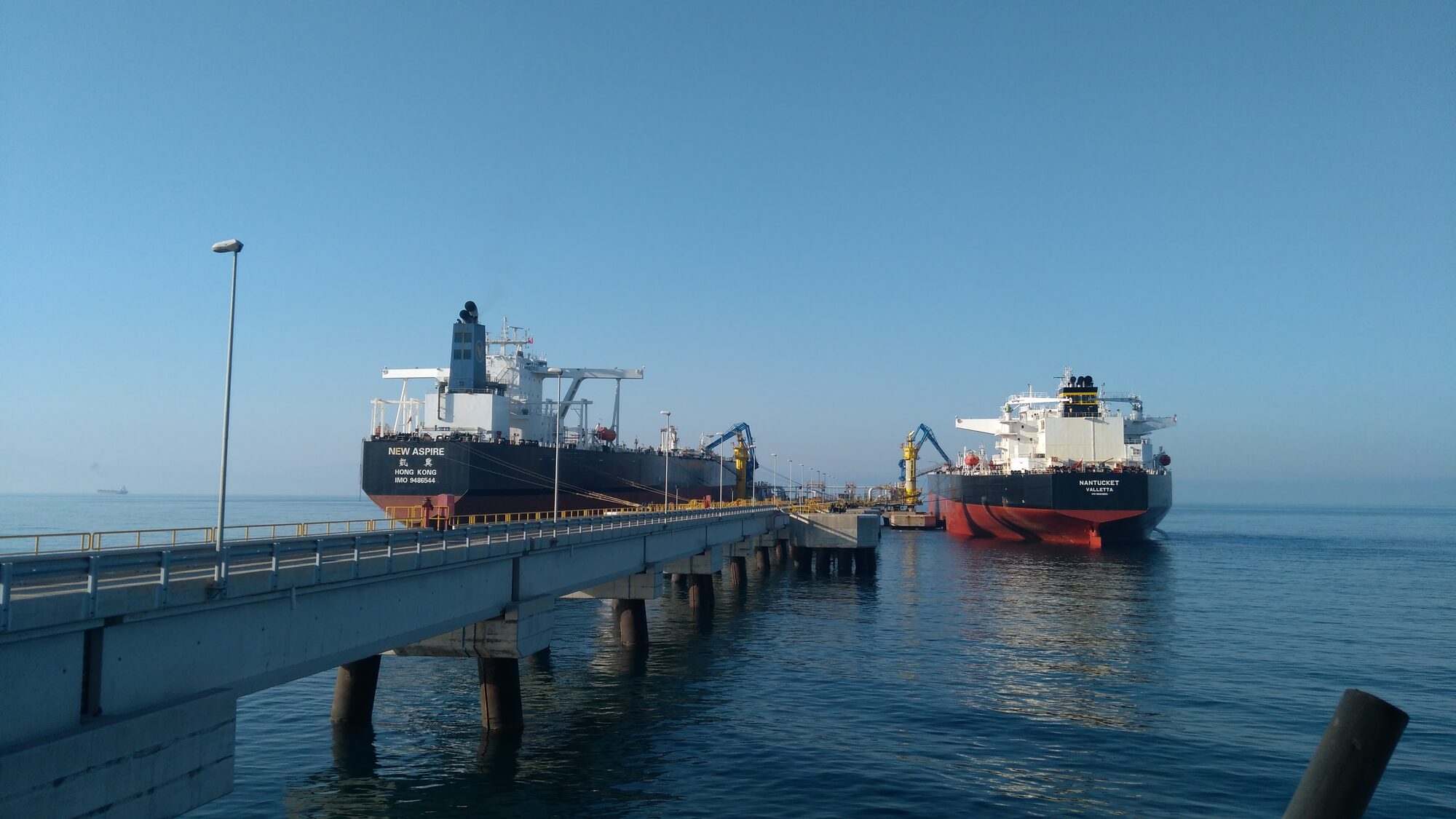 Two tankers at sea during a cargo operation